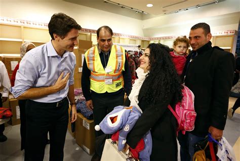 Syrian Refugees Greeted By Justin Trudeau In Canada The New York Times