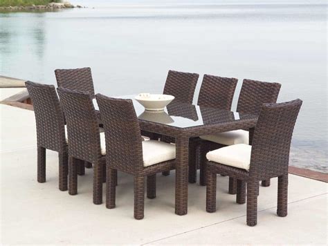 Most sets feature a square, rectangular or round table. Dining Room Brown Rattan With Glass Table Wicker Chairs ...