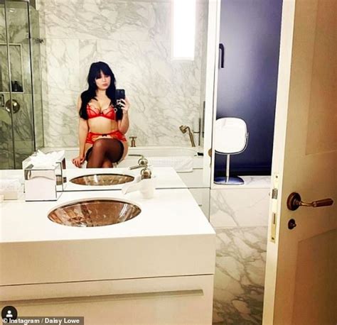 Daisy Lowe Shows Off Her Eye Popping Cleavage As She Luxuriates In A Hot Tub