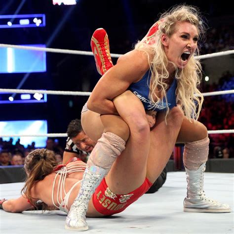 Photos Ronda Rousey And Charlote Flair Battle In Brutal Throwdown Charlotte Flair Ronda