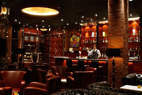 Cigar presses help make the cigar more symmetrical and give them a finished look. New Libre Cigar Lounge at Hilton Shanghai