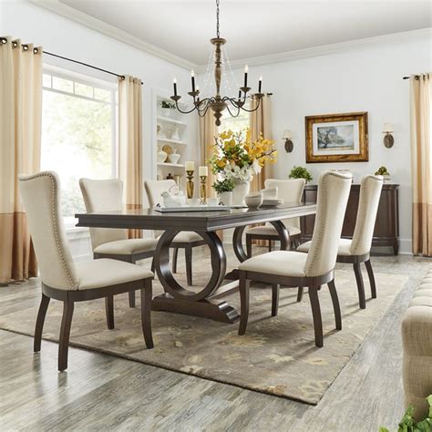 The set combines a kitchen island's spacious functionality with a traditional formal dining set's luxurious appeal. Willa Dark Cherry Wood and Beige Fabric Extendable Rectangular Dining Set by iNSPIRE Q Classic ...