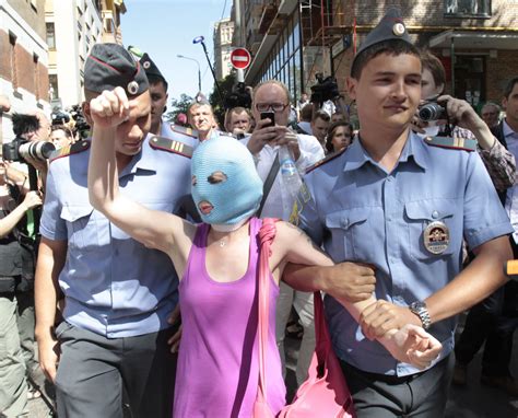 A Supporter Of The Female Punk Band Pussy Riot Is Detained By Police