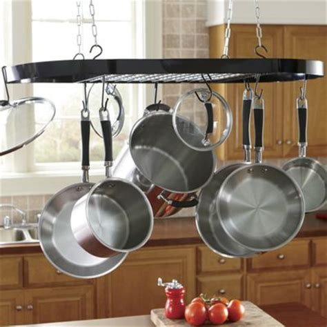 Space always comes at a premium, and when you're the pot rack simply hangs from the ceiling of your kitchen, freeing up valuable storage space by offering an area to hang pot and pans. Hanging Ceiling Pot Rack from Ginny's | J260556