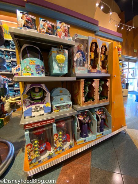 what s new at disney s pop century nostalgic drink koozies new mugs and two merch sales