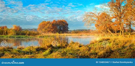 Beautiful Autumn Nature Landscape On Riverside Scenic River Nature In