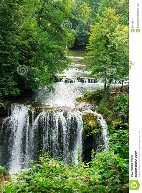 Beautiful Forest Cascade Waterfall With Clear Spring River Water Stock