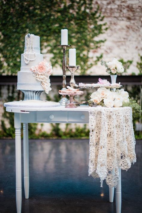 Table setting, tea party, female hand takes cake. 2014 Wedding Cake Trends #7 Dessert Tables | Bridal Musings
