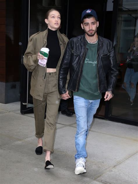 zayn malik arrives at his girlfriend gigi hadid s apartment in a wheelchair sparking fears for