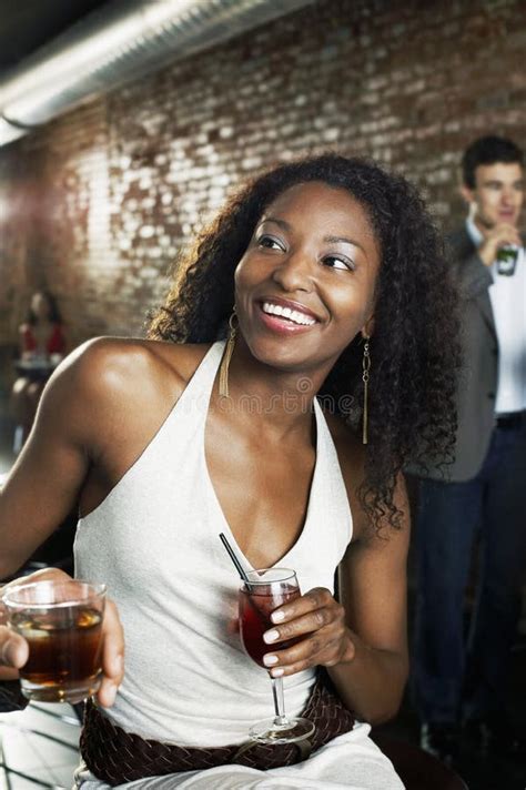 Woman With Cocktail Sitting In Bar Stock Image Image Of Cheerful