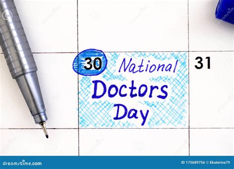 Reminder National Doctors Day In Calendar With Blue Pen Stock Photo