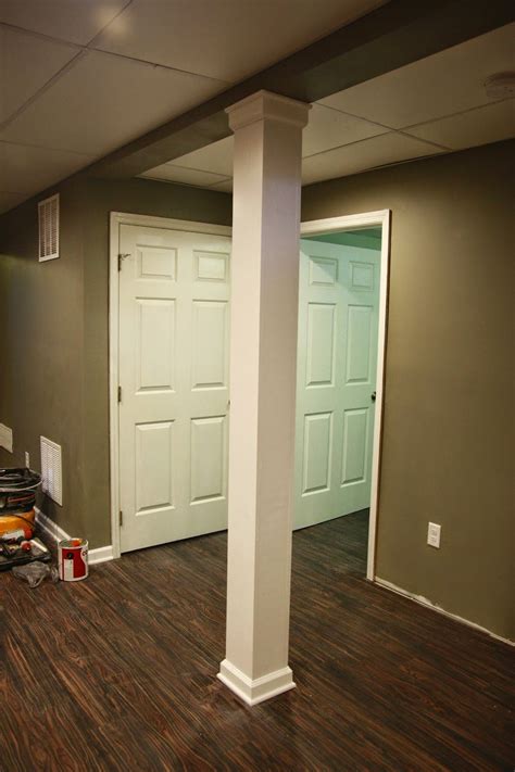 If you are looking for ideas on how to finish basement columns, you will be amazed to see all the possibilities available. Over on Dover: A Post About A Post: Disguising A Basement ...