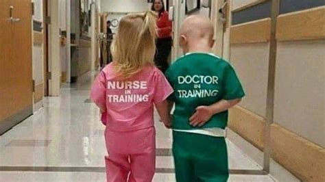 Photo Of Girl Wearing Nurse In Training And Boy In Doctor In