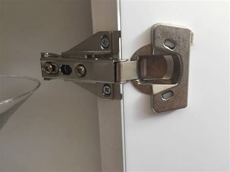 Cabinet door hinges are also typically inexpensive making updates and repairs manageable. kitchens - How can I remove a MEPLA cabinet door hinge ...