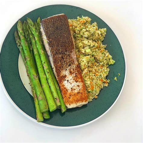 Spoon potato mixture over lettuce; homemade salmon with asparagus and riced cauliflower ...