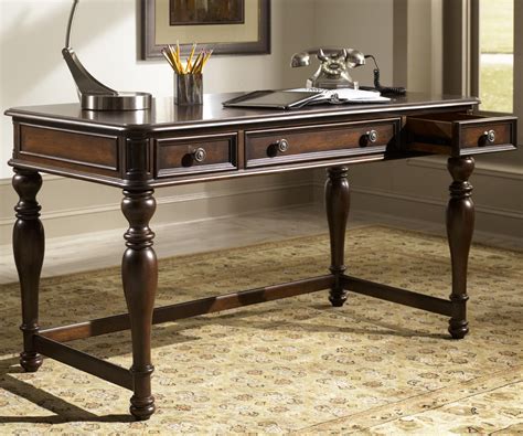 >a computer desk, an entryway table, a bedroom vanity—this writing desk evolves with your lifestyle or when you change homes. Writing Desk with Three Drawers in Cognac Finish by Liberty Furniture | Wolf and Gardiner Wolf ...