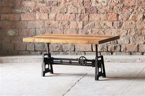 The lower table features rich textured walnut paper, while the smaller floating table boasts an elegant white carrara faux marble top. Hyatt-Fulton Industrial Adjustable Height Coffee/Dining ...