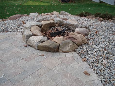 Building a fire pit with natural rocks. Outdoor Fire Pit Design CT | Fire Pit Installation ...