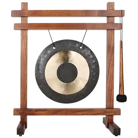 A Beautiful Brass Tabletop Sized Gong Features A Wooden Stand Gongs