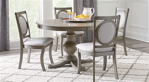 Table extends by pulling both ends and dropping in leaf. Black, White & Gray Dining Room Furniture: Ideas & Decor