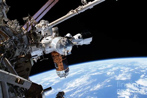 Spacex Crew Dragon Docked To The Iss Photograph By Nasascience Photo