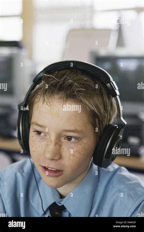 Secondary School Student Learning Languages Using Headphones Stock