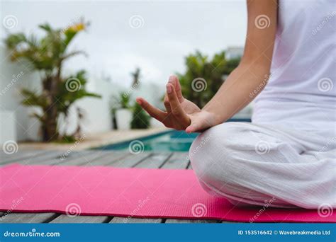 Woman Performing Yoga Near Swimming Pool In The Backyard Stock Photo Image Of Closeup