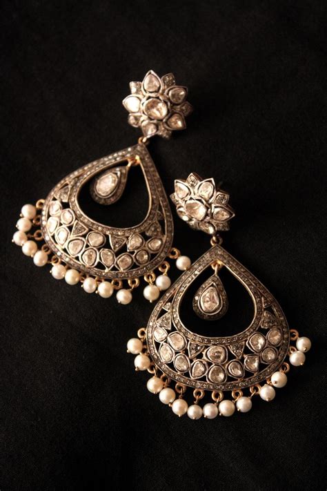 If it's gold that your heart desires, then choose from our wide range be it an office meeting or an important occasion, the gold earrings and diamond earrings in the kirtilals collection are sure to make you the center of. Indian Style Earrings - Threads - WeRIndia