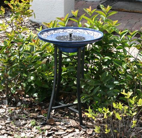 You can stand your bird bath on an old candlestick or table leg, or sit it on top of a larger overturned plant pot. 20 Solar Water Fountain Ideas For Your Garden (With images ...