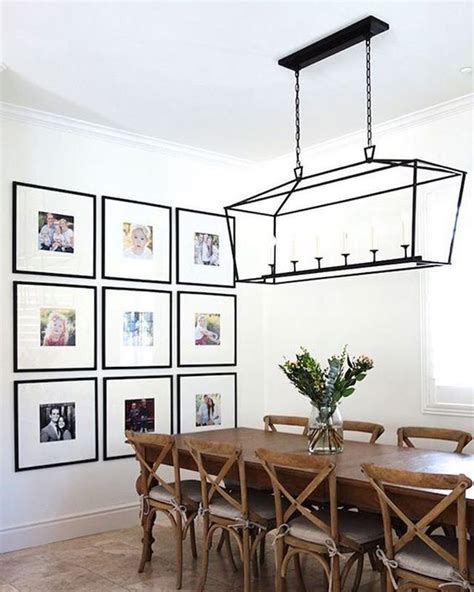 Family photo salon walls are collections of images, artfully framed and arranged. modern-family-photo-gallery-wall-in-dining-room | HomeMydesign