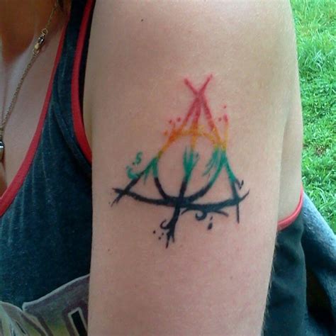 #halloween #my pumpkin #deathly hallows sign #crimes of grindelwald #fantastic beasts #fantastic beasts and the crimes of grindelwald #newt scamander i have started drawing the deathly hallows signs on my wrist. Deathly Hallows Tattoo explained - 100+ Deathly Hallows ...