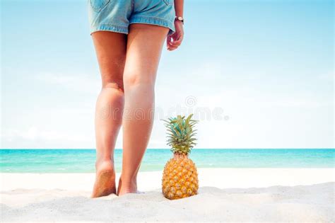 Relaxation And Leisure In Summer Seashell On Tanned Girl Arm At