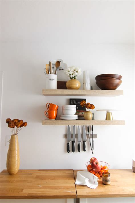 Before, the counter tops seemed to just blend in with the cabinets. Kitchen Before + After: How I Painted My Kitchen Cabinets ...