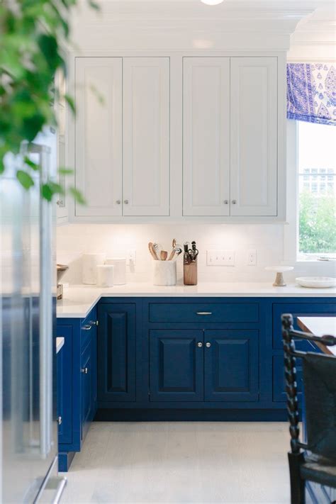 After all, most of us spend a good amount of time in the kitchen. Blue kitchen cabinets in the Mark D. Sikes Coastal Living ...