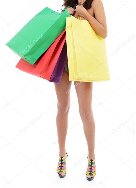 Mujer desnuda sosteniendo bolsas de compras fotografía de stock khorzhevska