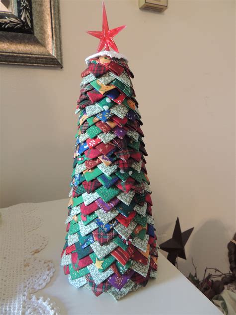tree i made using a stra foam cone and 2 inch square fabric folded into a tria… fabric