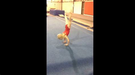 6 Year Old Gymnast Does A Straddle Press Handstand