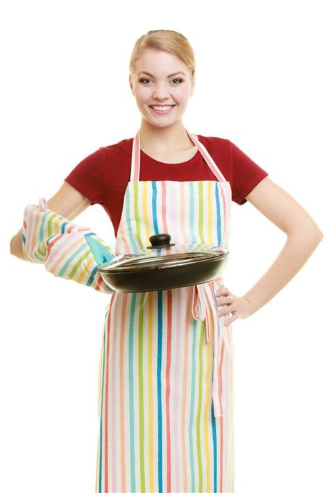 Housewife Or Chef In Kitchen Apron With Skillet Frying Pan Stock Photo