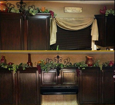 Add fun details to your ensemble in the form of a curtain rod with leafy grape cluster finials. vine for cabinets. wine theme ideas for my kitchen | Wine ...