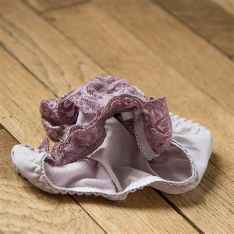 Premium Photo Close Up Of Panties On Hardwood Floor