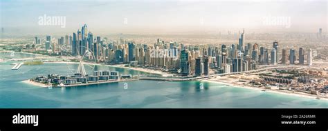 Panoramic Aerial View Of Dubai Marina Skyline With Dubai Eye Ferris