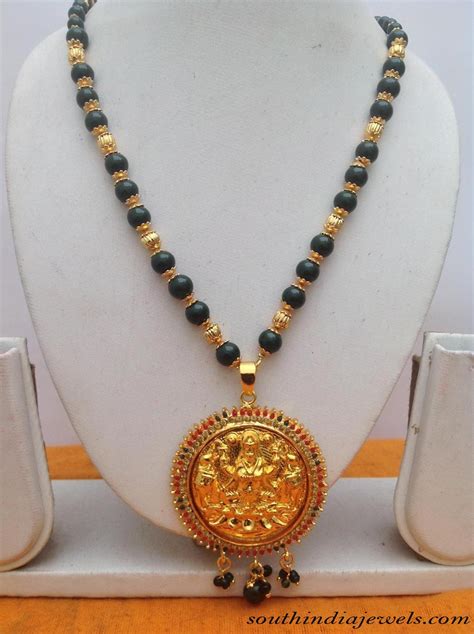 traditional lakshmi pendant design south india jewels
