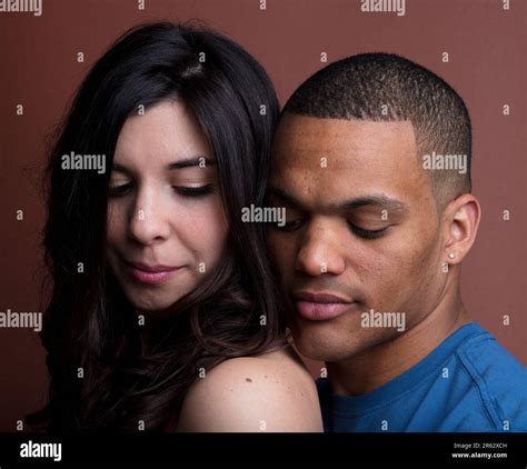 Intimate Multiethnic Couple Portrait She Fair Skinned With Long Black Hair He Dark Skinned