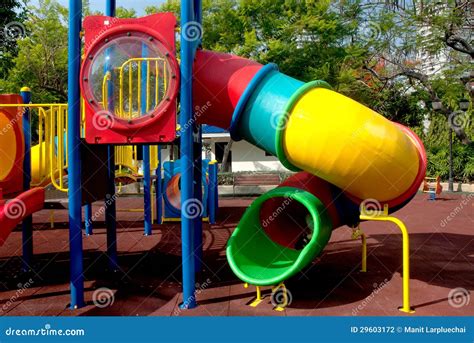Colorful Spiral Tube Slide At Public Playground Stock Photography