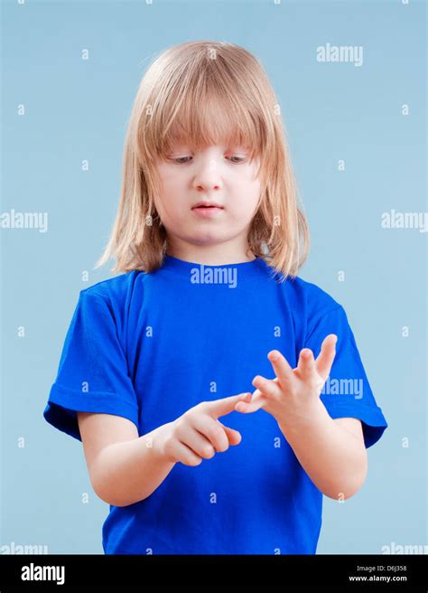 Boy Counting On Fingers Hi Res Stock Photography And Images Alamy