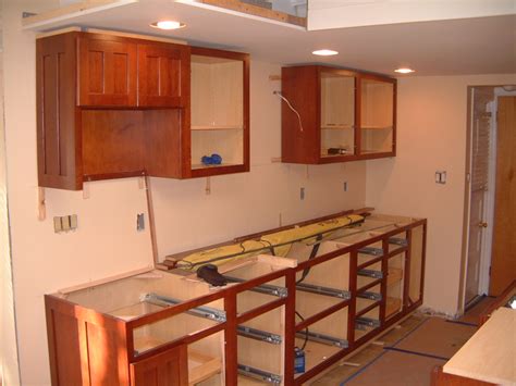 If you're thinking about installing cabinets yourself, this series of installation videos will help you learn how. Springfield Kitchen - Cabinet Install - Remodeling Designs ...