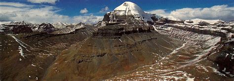 Kailash mansarovar om, black mountain covered with snow, nature. Best Places to Visit in Tibet