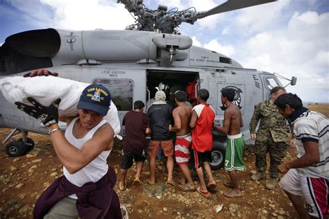 Typhoon Haiyan Aid Begins Trickling Into Desperate Philippines Communities Nbc News