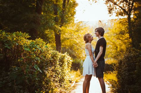 Guy And The Girl Embracing On A Background Of Park Stock Image Image