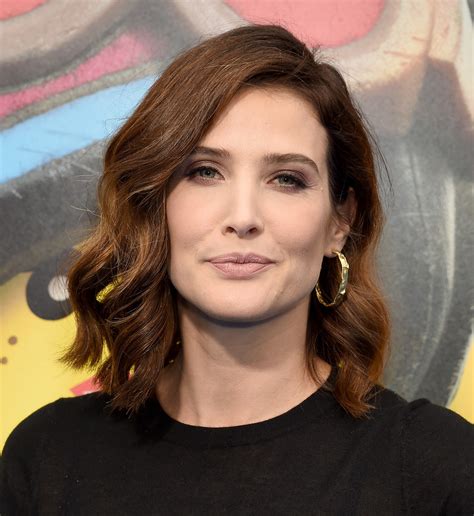 Heavily tousled hair are braided in a cute and chic manner: Cobie Smulders Medium Wavy Cut - Hair Lookbook - StyleBistro